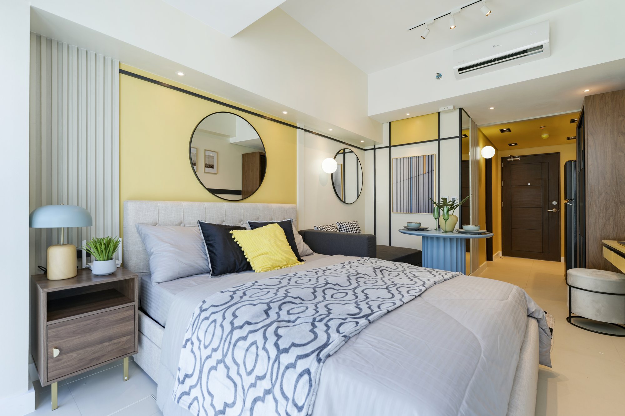 The bedroom and lounge area of the Amber Room condo in Cebu IT Park