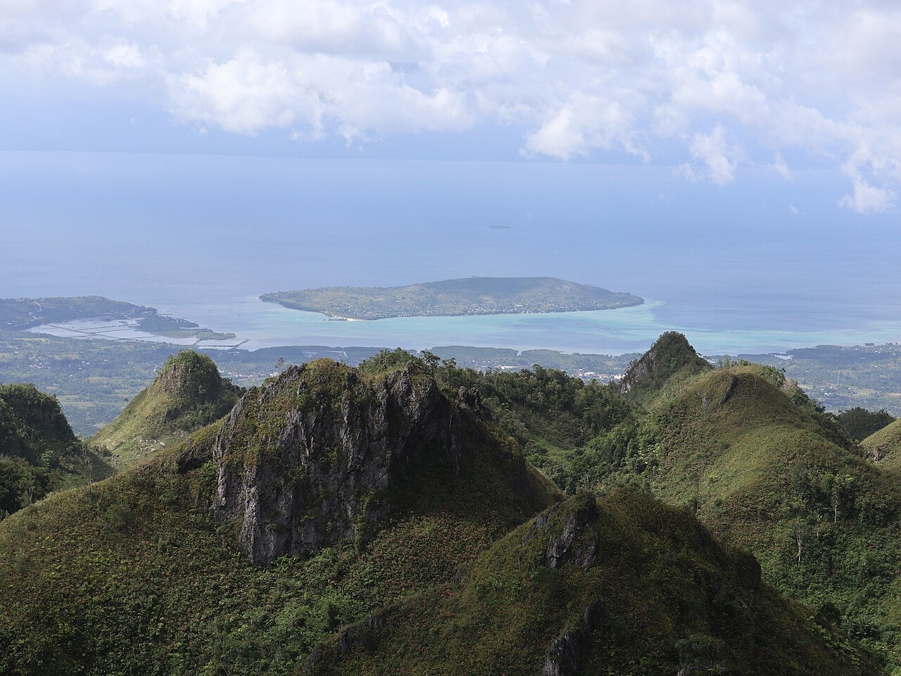 View from Osmeña Peak over the hills of Dalaguete toward Badian Island and the sea